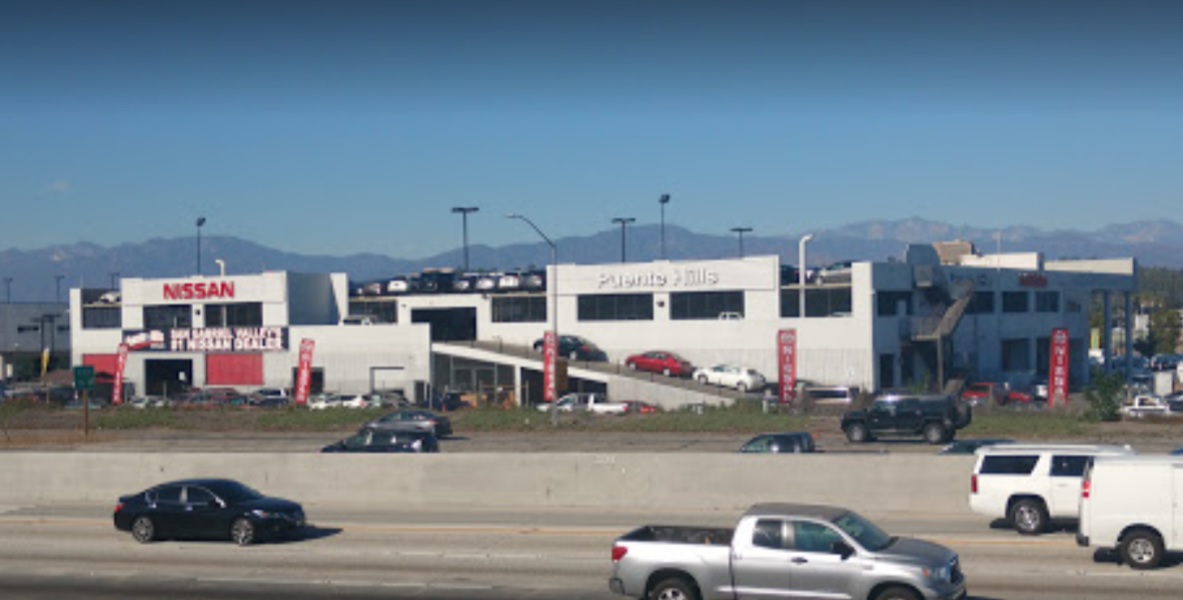 Freeway view of Nissan dealership